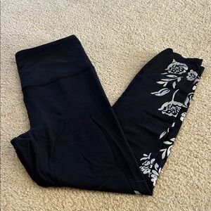Athleta Black Elation Eyelet 7/8 tight Leggings with Gray  Floral Design. Size S